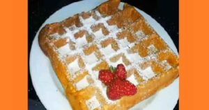 Молочные вафли в вафельнице. Фото