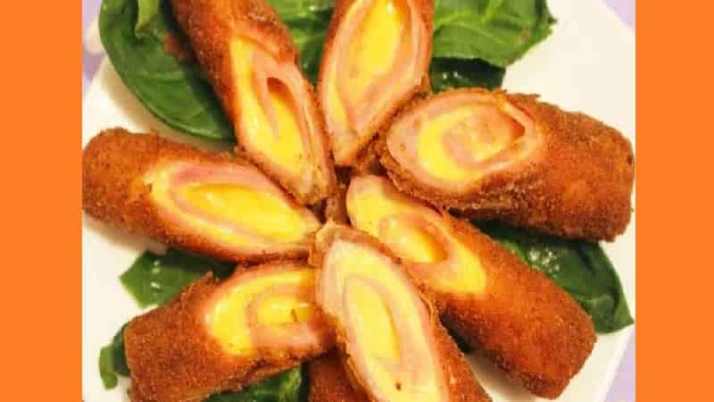 Рулетики з шинки з начинкою. Фото