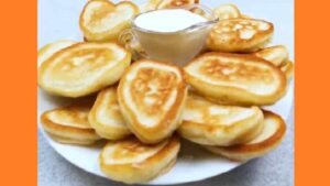 Пышные оладьи на кефире с содой Пишні оладки на кефірі із содою. Фото