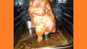 Курица на бутылке в духовке Курка на пляшці в духовці. Фото