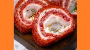 Закусочний рулет з буряка та оселедця Закусочний рулет з буряка та оселедця. Фото